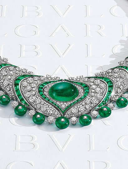 Emerald Lotus High Jewellery platinum necklace with emeralds and diamonds.