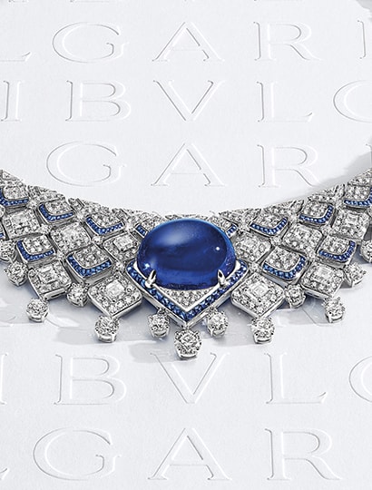 Southern Sapphire Mediterranea High Jewelry platinum necklace with an oval central sapphire, emeralds and diamonds.
