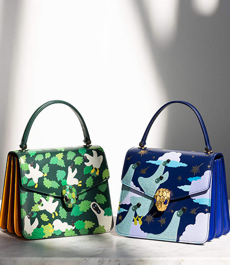 Serpenti Forever Top Handle bags in green and blue calf leather, designed by artist Sunwoo Kim.