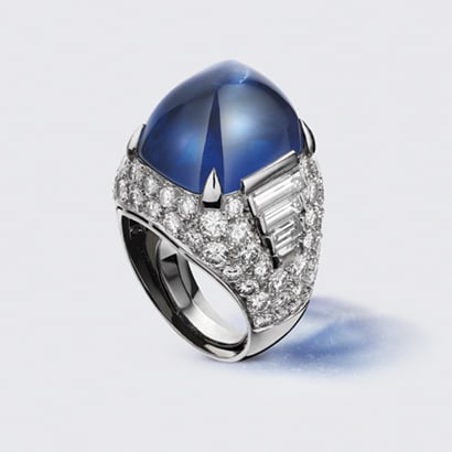 Trombino ring in platinum with sapphire and diamonds.