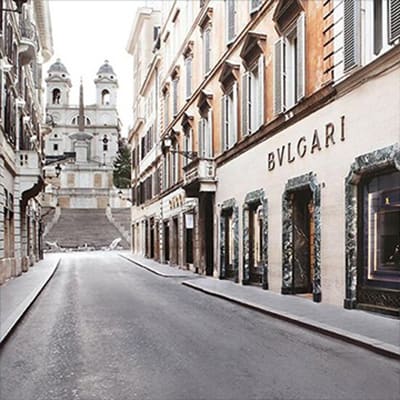 Facade of the Bulgari store in via Condotti, Rome, and Spanish Steps in the background.
