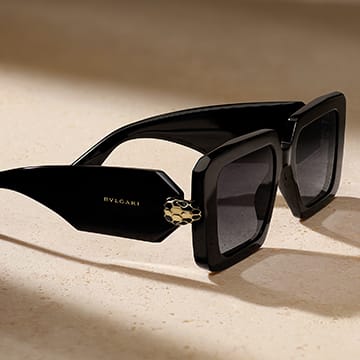Serpenti Forever sunglasses with an oversized rectangular black acetate frame and gradient lenses.