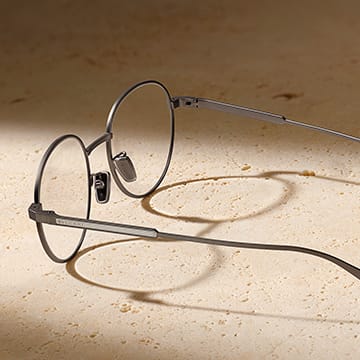 Octo Finissimo glasses for men with a titanium pantos frame and blue light filter lenses.