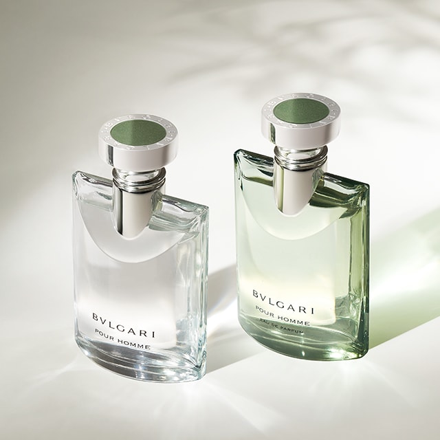 Bvlgari Pour Homme Eau de Parfum and Eau de Toilette fragrance bottles, neutral luminous backdrop.