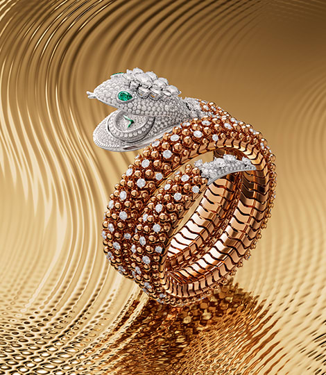 Serpenti Pallini High Jewellery secret watch in rose and white gold with diamonds, creative shot.