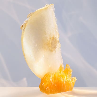 Bamboo and nashi, the top notes of the Omnia Crystalline fragrance, creative shot.