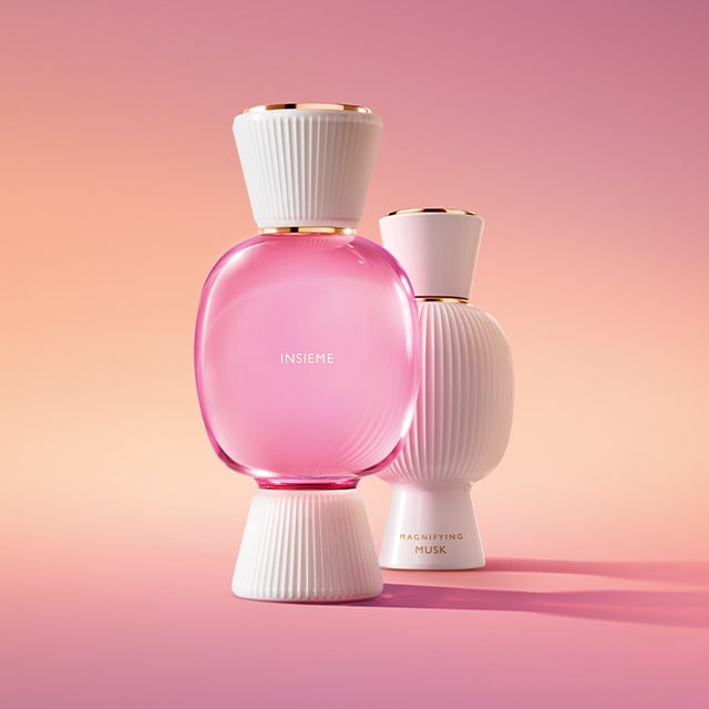 Blue and pink bottle of the Bvlgari Allegra Chill & Sole fragrance and white bottle of the Magnifying Neroli essence.