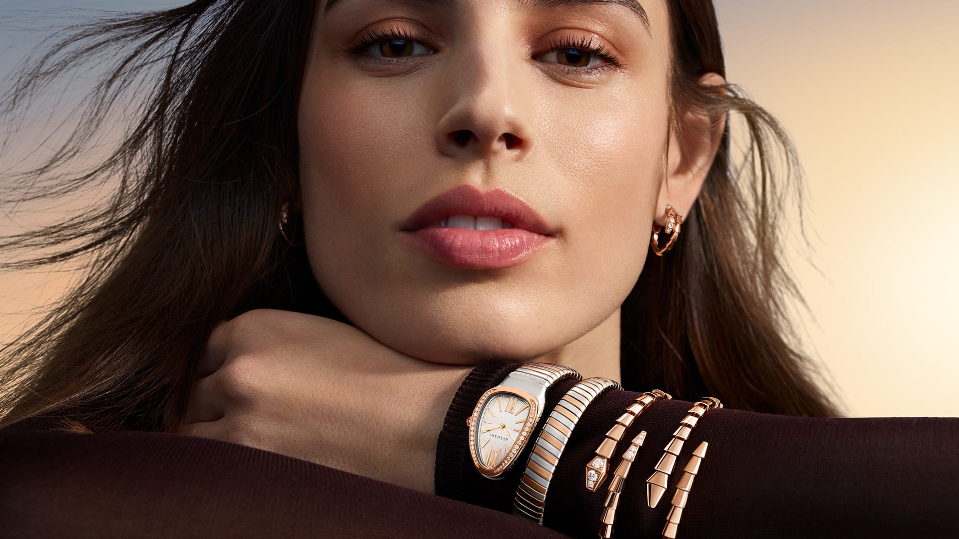 Model wearing Serpenti jewellery and watch.