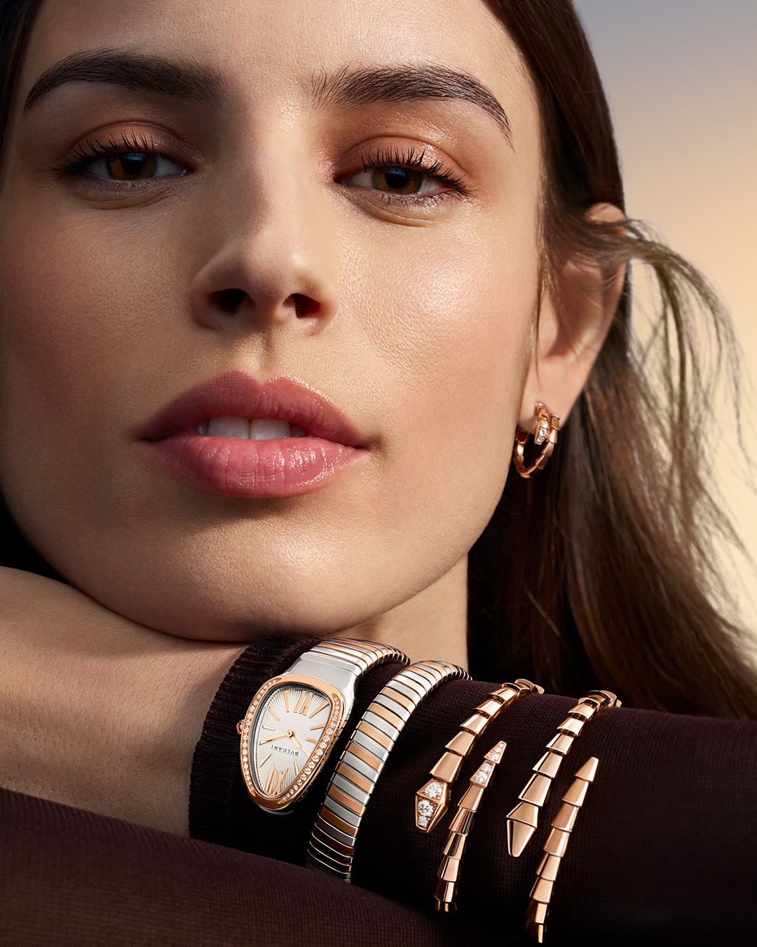 Model wearing Serpenti jewellery and watch.