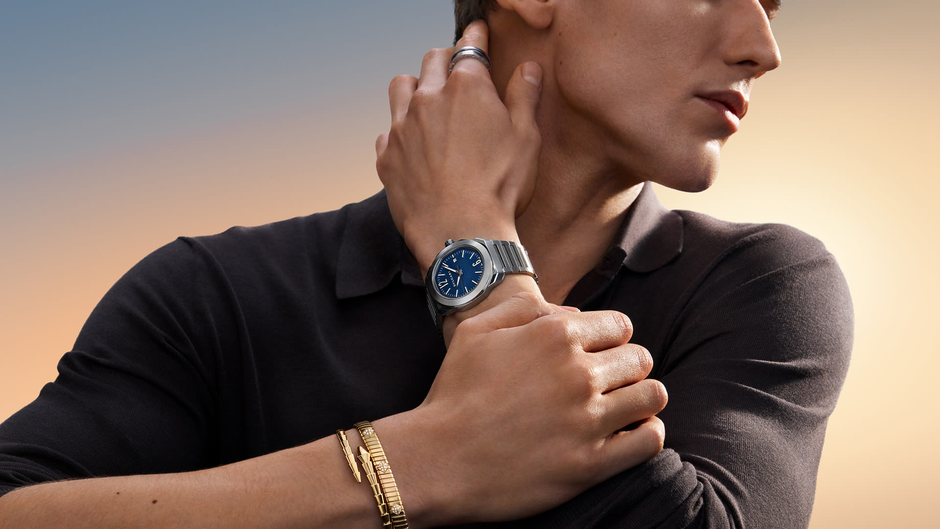Model wearing Octo watch and Bvlgari Tubogas bracelet.
