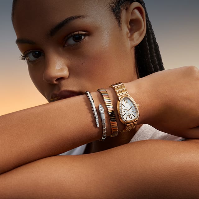 Model wearing Serpenti watch and bracelet, Magnificent Icons.