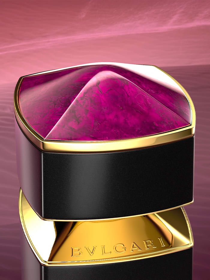 Purple cap of the Bvlgari Le Gemme Sahare fragrance inspired by the Pink Jasper, purple backdrop.