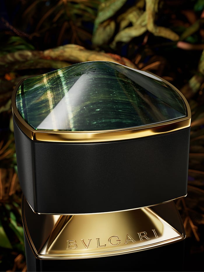 Dark green cap of the Bvlgari Le Gemme Falkar fragrance inspired by the Falcon's Eye stone, close up.