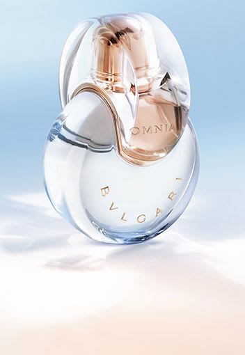 Bottle of the Bulgari Man Rain essence fragrance for men, creative close up shot.