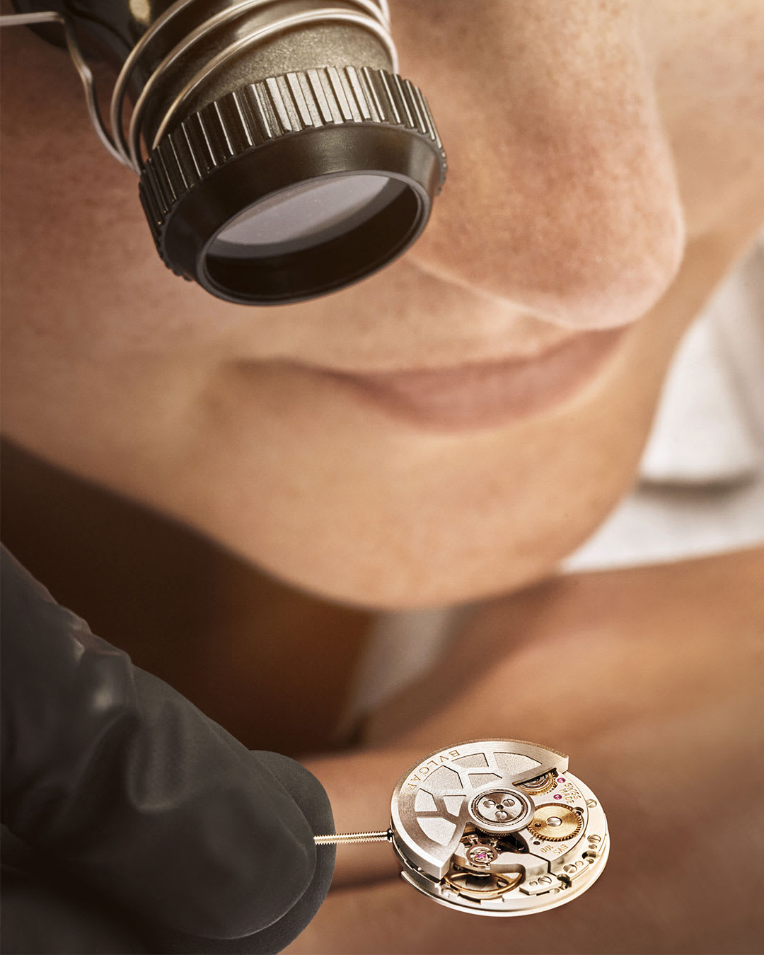 Gemstone setting during the Tubogas Manchette watch making of, close up.