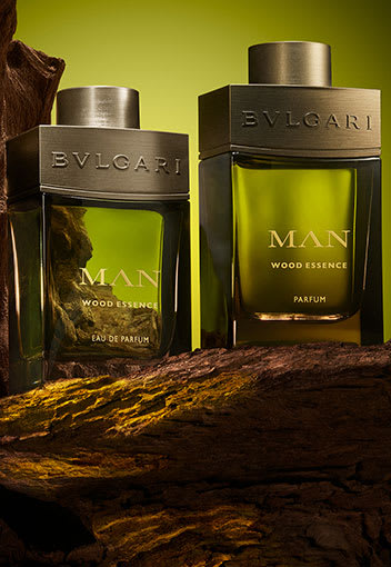 Bottle of the Bulgari Man Rain essence fragrance for men, creative close up shot.