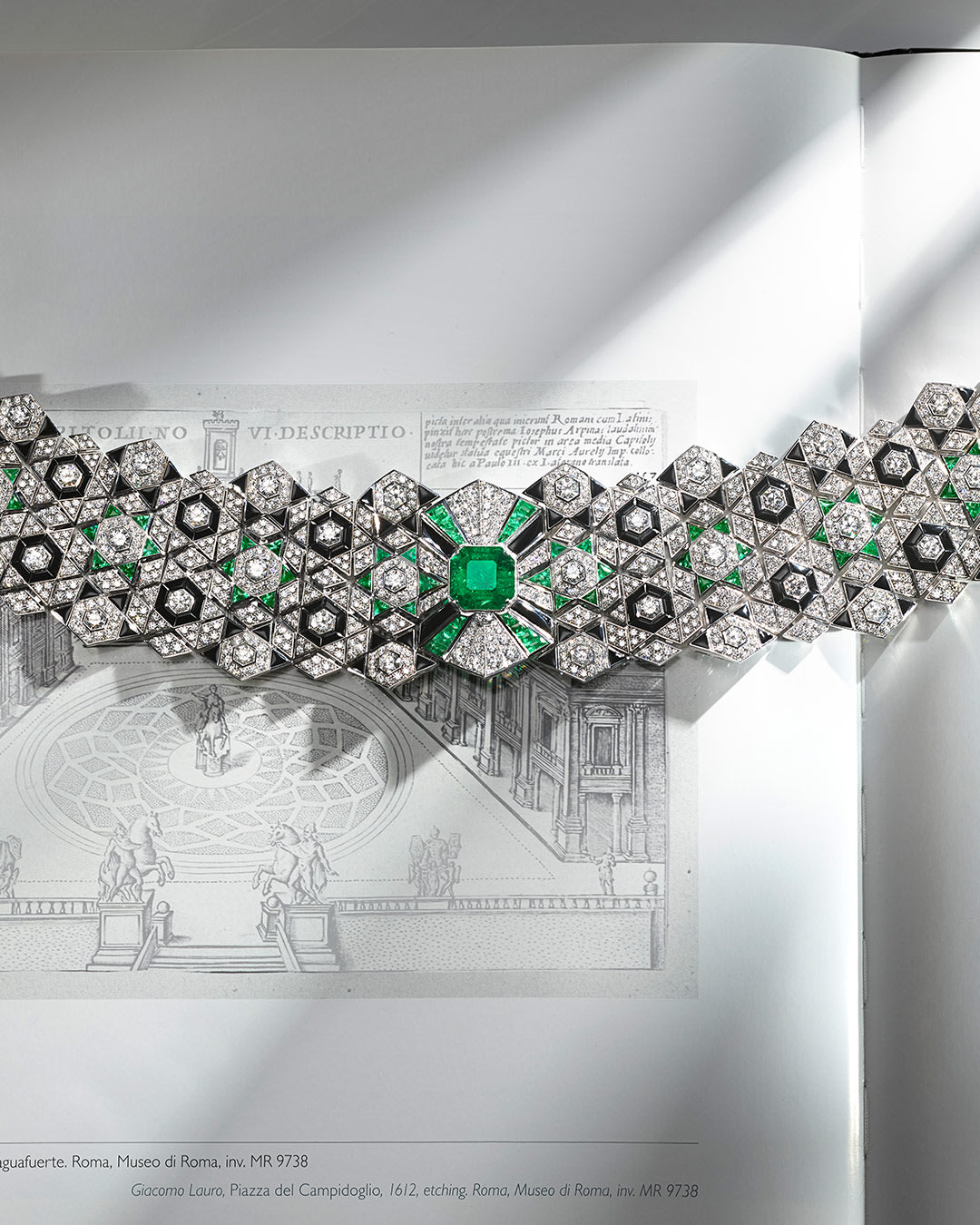 Eclectic Embrace High Jewellery white gold necklace with octagonal emerald, onyx, emeralds and diamonds.
