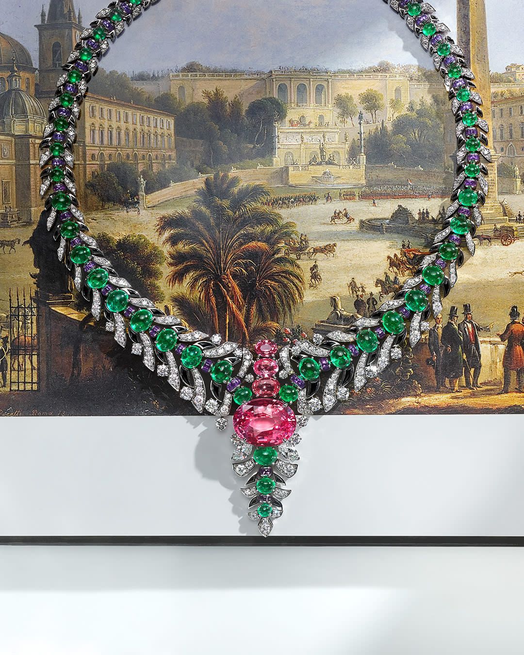 Secret Garden High Jewellery platinum necklace set with a Padparadscha sapphire, emeralds and diamonds.
