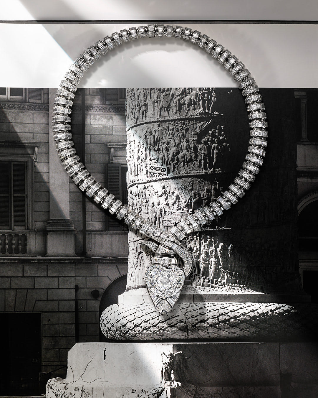 Serpenti Imperial Heart High Jewellery white gold necklace with diamond on the snake's head and diamond pavé.