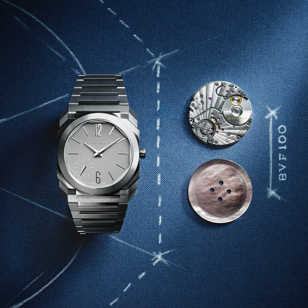 Octo Finissimo Automatic 37 mm watch with movement and button in the same size on blue background.