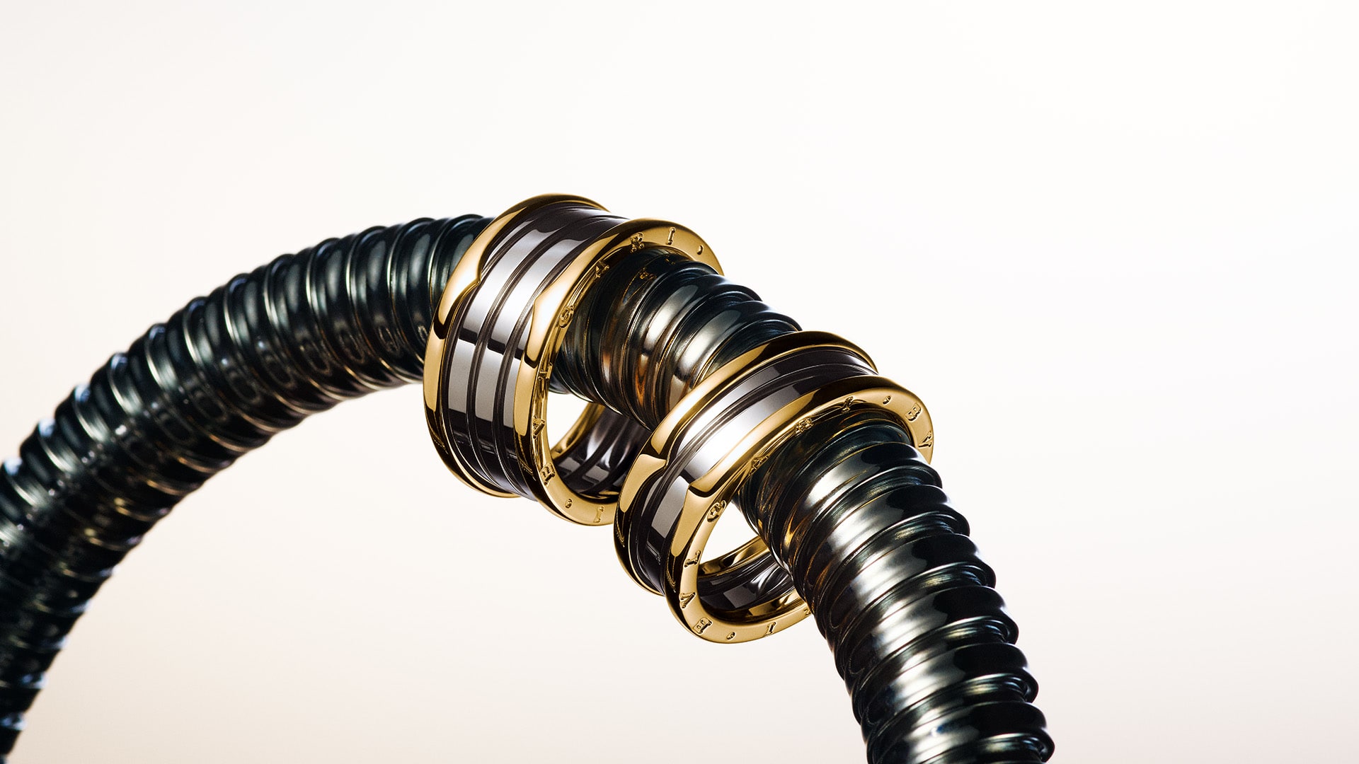 B.zero1 rings, Gold and Steel creative shot.