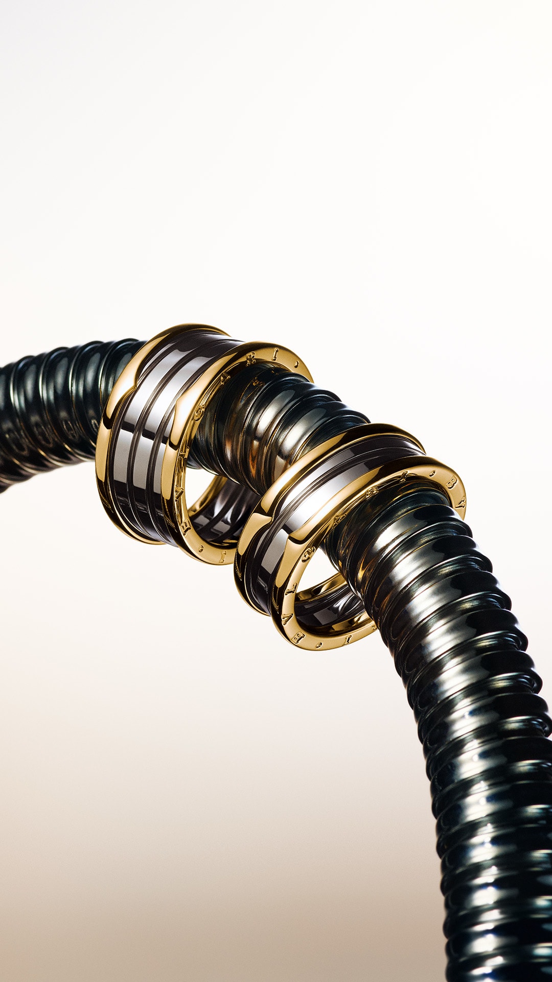 B.zero1 rings, Gold and Steel creative shot.