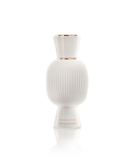 White flacon of the Bvlgari Allegra Magnifying Myrrh essence, creative shot.