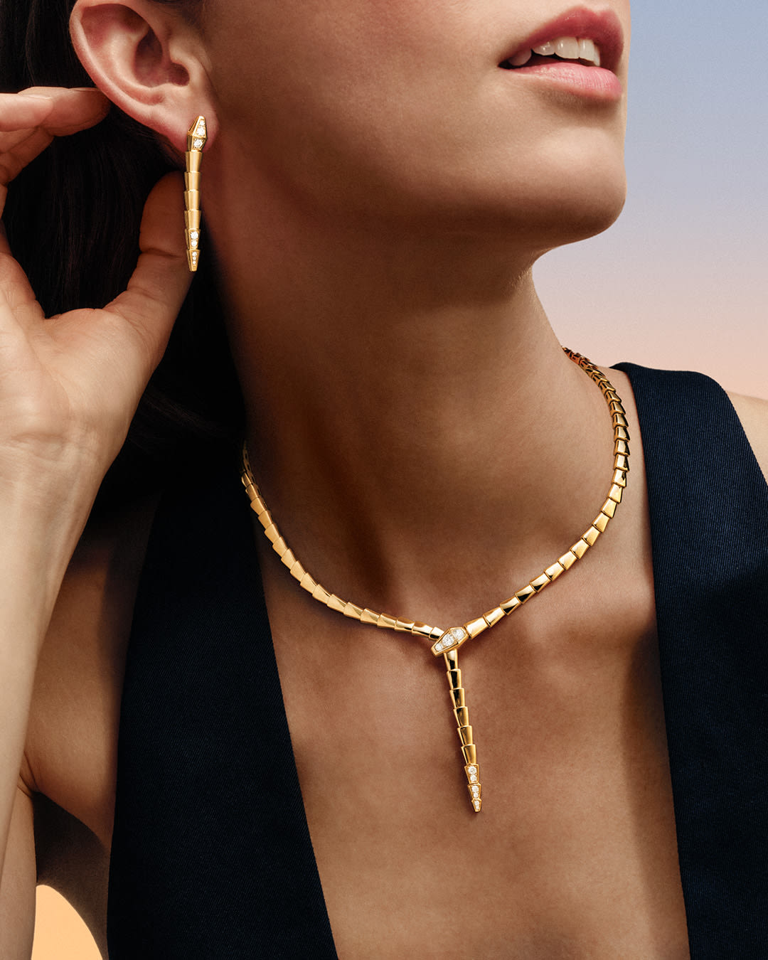 Model wearing Serpenti Jewellery.