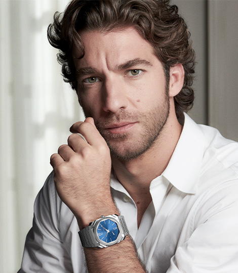 Bulgari Brand Ambassador Lorenzo Viotti wearing the Octo Finissimo Automatic steel watch with blue dial.